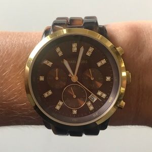 Michael Kors tortoise shell watch.